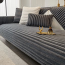 Thick winter sofa cushion in imitation rabbit fur.