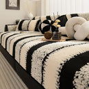 Waterproof sofa cover with a soft finish.