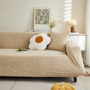 Elastic sofa cover with camellia jacquard print.