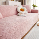 Elastic sofa cover with camellia jacquard print.