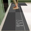 Black, long kitchen mat made of waterproof PVC.