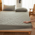 Waterproof padded mattress protector