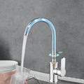 Kitchen faucet with hot and cold water.
