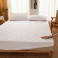 Waterproof padded mattress protector