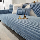 Thick winter sofa cushion in imitation rabbit fur.