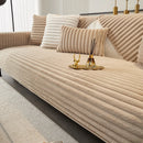 Thick winter sofa cushion in imitation rabbit fur.