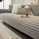 Thick winter sofa cushion in imitation rabbit fur.