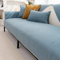 Universal chenille sofa cover with non-slip texture.