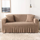 Sofa cover with a highly elastic bubble texture.