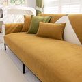 Universal chenille sofa cover with non-slip texture.