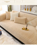 Thick winter sofa cushion in imitation rabbit fur.