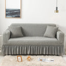 Sofa cover with a highly elastic bubble texture.