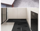 Black, long kitchen mat made of waterproof PVC.