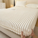 Thick, solid-colored faux rabbit fur mattress cover