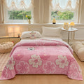 Multifunctional velvet blanket with snowflake print.