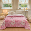 Multifunctional velvet blanket with snowflake print.