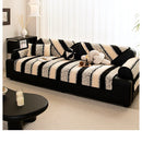 Waterproof sofa cover with a soft finish.