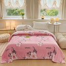 Multifunctional velvet blanket with snowflake print.