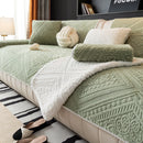 Soft microfiber sofa cover with elastic hem.