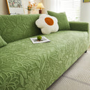 Elastic sofa cover with camellia jacquard print.