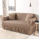 Sofa cover with a highly elastic bubble texture.
