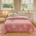 Multifunctional velvet blanket with snowflake print.