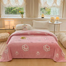Multifunctional velvet blanket with snowflake print.