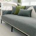 Universal chenille sofa cover with non-slip texture.