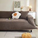 Elastic sofa cover with camellia jacquard print.